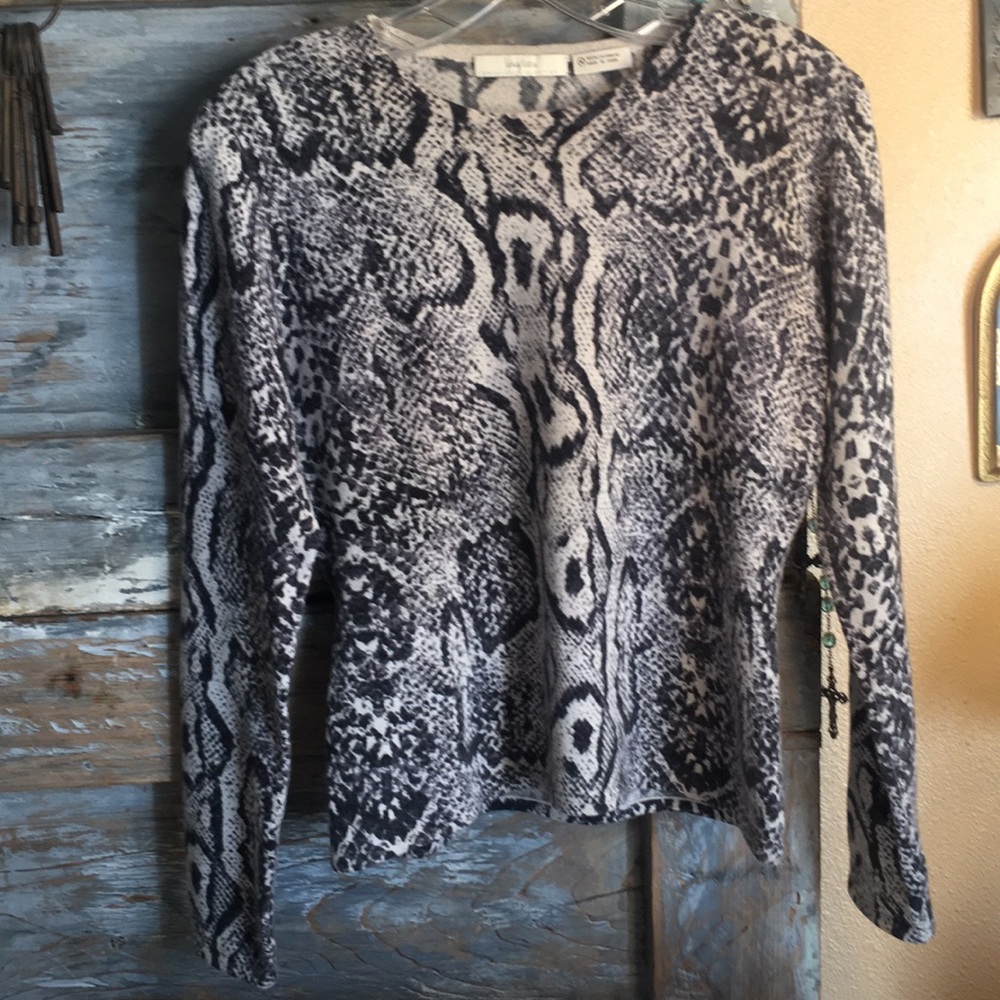 Snake print cashmere sweater.